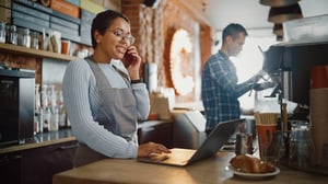 coffee shop barista connect with customer over the phone.