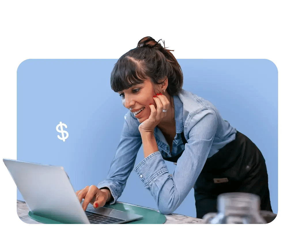 Businesswoman reviewing payroll documents, representing FrankCrum’s accurate and on-time payroll processing with responsive support