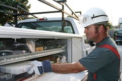 Construction worker wears protective gear to stay safe on the job.