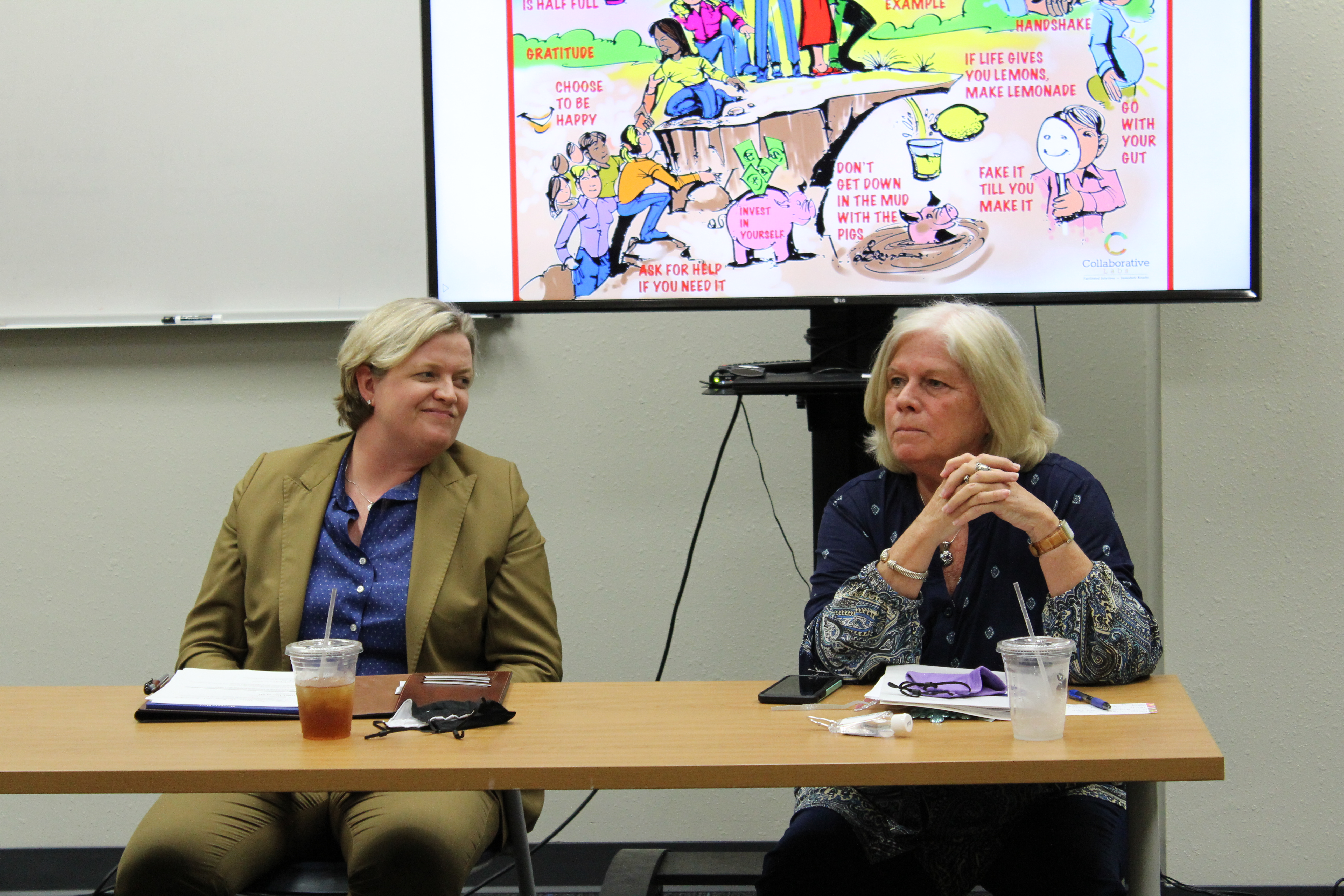 Haley Crum (left) interviewing her mentor, Carol Hague, at a luncheon titled 